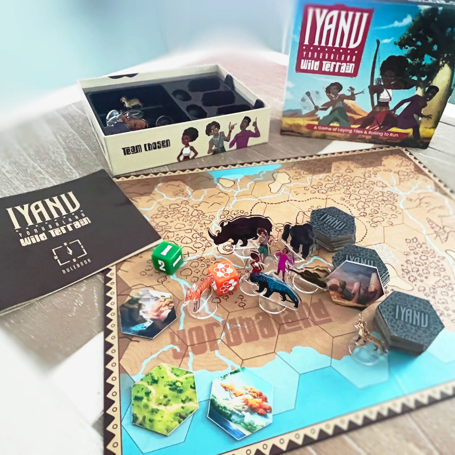 Board game 'IYANU' with pieces and dice on a table